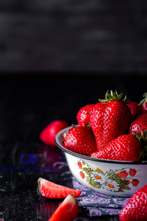 Fresh new image of strawberries on a slate background iの写真素材