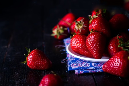 Fresh new image of strawberries on a slate backgroundの写真素材