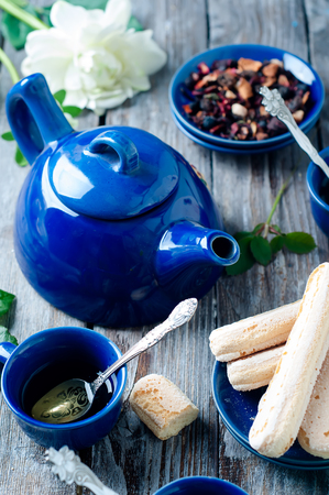 Tea set, herbal tea and cookies Savoiardiの写真素材