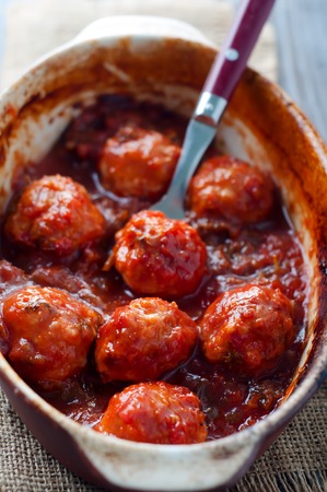 Meatballs in sweet and sour tomato sauce. Top viewの写真素材