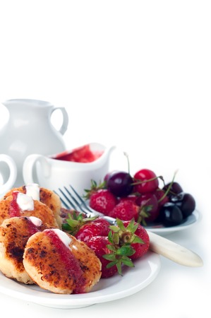 Cottage cheese pancakes in white backgraund andの写真素材