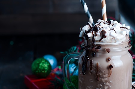 Iced coffee, frapuccino with whipped cream and chocolate syrupの写真素材