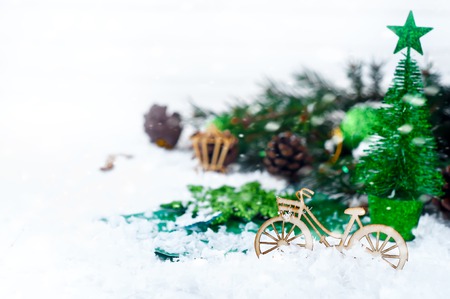 Christmas decoration on a green background - Christmas tree and bikeの写真素材