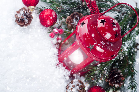 Christmas lantern with snow background on white boardsの写真素材