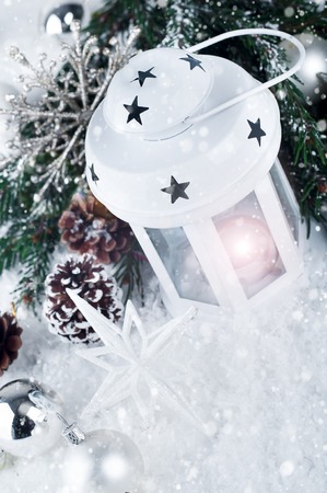 Christmas and New Year background with Christmas candle lantern and Christmas decorationsの写真素材