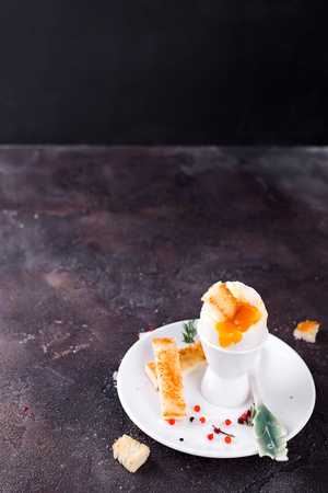 salmon and soft cheese spread, mousse, pate in a jar with crackers on white wooden backgroundの写真素材