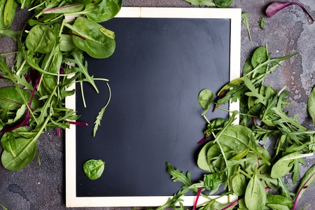 Mixed salad leaves with chalk board, Background, textureの写真素材