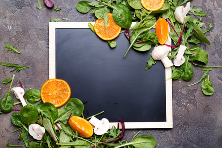 Mixed salad leaves with chalk board, Background, textureの写真素材