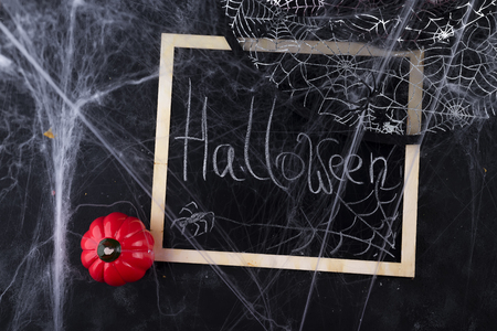 Hat of a witch and a chalkboardの写真素材