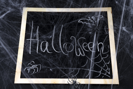 Chalkboard on a black backgroundの写真素材