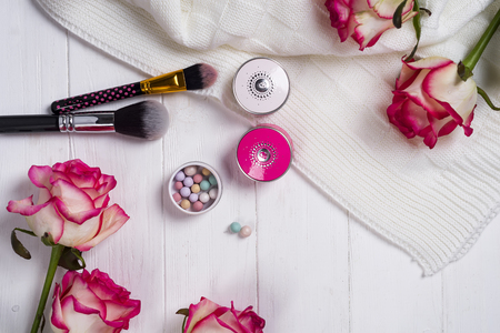 Women cosmetics and fashion items on white wooden backgroundの写真素材
