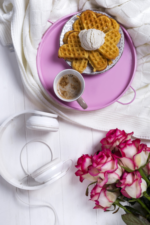 Coffee with waffles and roses. Valentines Day or 8 march . Delicious Breakfast.の写真素材