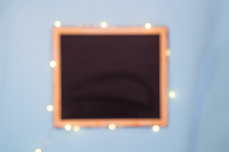 slate chalk board template menu on blue paper background, flat lay with copy space. Menu concept Blurred backgroundの写真素材