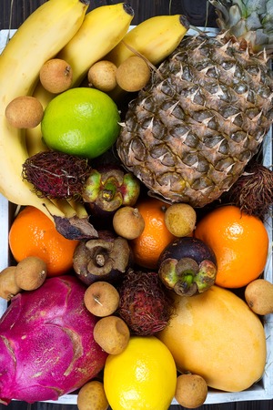 Tropical fruits many colorful ripe tropical fruitsの写真素材