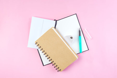 School notebook on a pink
