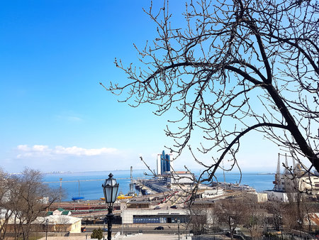 Odessa, Ukraine, 15.03.2018: Odessa Marine Station with a moored warship.
