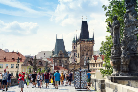 Prague, Czech Republic 18.07.2018: Charles Bridge statues and medieval towers. Unique panoramic view...