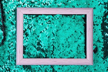White frame on a sequins green glitter wave  texture, copy spaceの写真素材