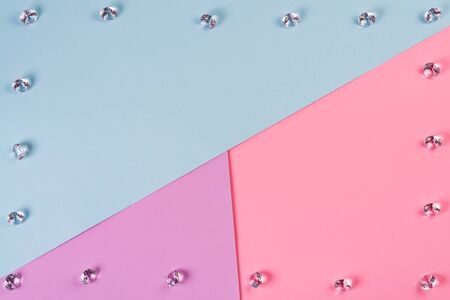 Crystals on pink blue background. Holiday background. Minimal concept. Flat lay. Top view.の写真素材