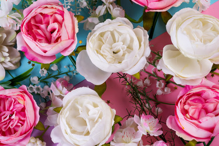 Artificial flowers background. Floral Holiday concept