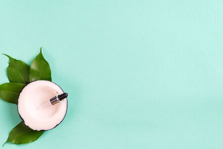 Handmade soap bars coconut with leaves on green background. Healthy homemade conceptの写真素材