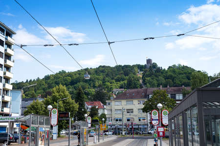 Karlsruhe, Germany - July 27, 2018. City street with houses and urban transport lane on a background of blue sky in city Karlsruhe, Baden-Wuerttemberg, Germany.のeditorial素材