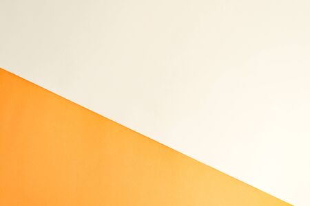 Duotone diagonal papercraft background for your creativity orange and white colors.の写真素材