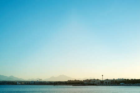 Morning view of coastline with hotels from the water.の写真素材