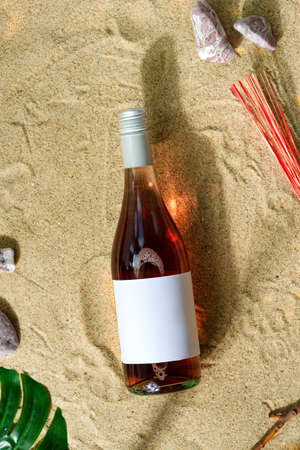Mockup wine bottle on a beach.の写真素材