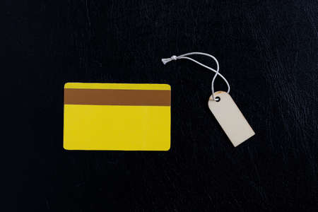Mockup gold credit card for shopping and clothing tag.の写真素材