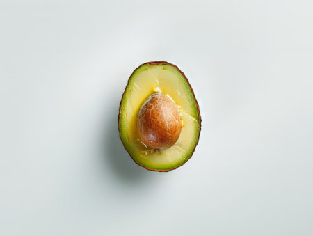 Avocado Halves Without Pit on White Backgroundの素材