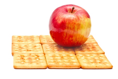 Apple on top of the pastry square isolate on a white backgroundの写真素材