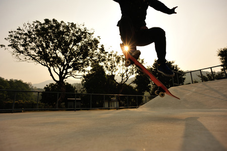 skateboarding at sunrise skateparkの写真素材