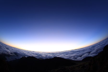 beautiful rolling clouds and sunrise landscapeの写真素材