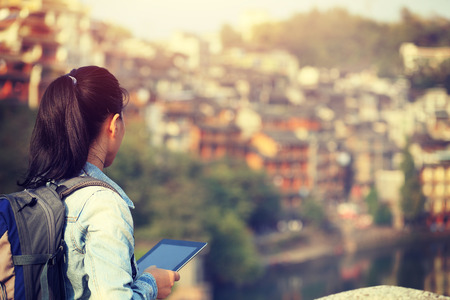 young woman tourist use digital tabletの写真素材