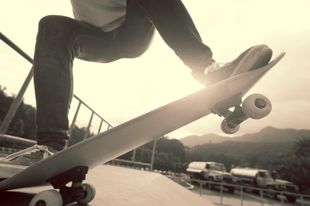 skateboarding legs sunrise skateparkの写真素材