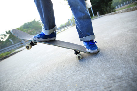 skateboarder skateboarding at skate park