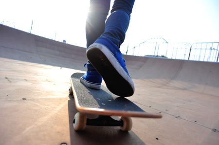 skateboarder skating at skate parkの写真素材