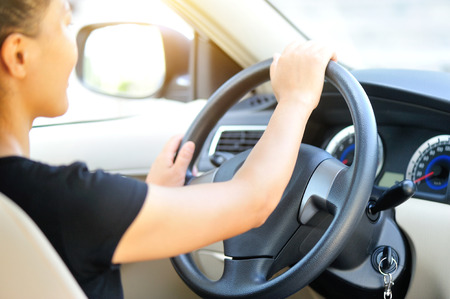 woman driver driving in carの写真素材
