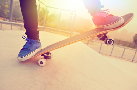skateboarding at sunrise skateparkの写真素材