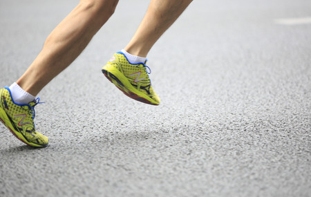 marathon runner running on city roadのeditorial素材