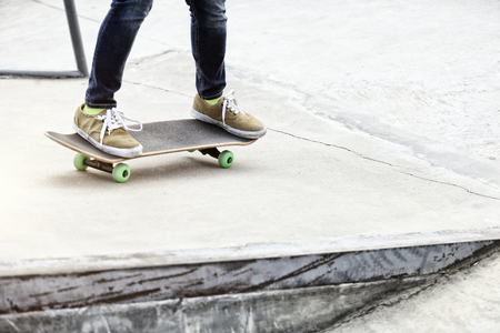 skateboarding woman legs at skateparkの写真素材