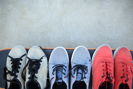 sneakers and skateboard at skateparkの写真素材