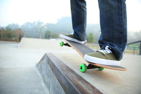 skateboarding legs at skateparkの写真素材