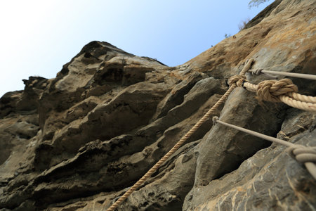 rock for climbing under blue skyの写真素材