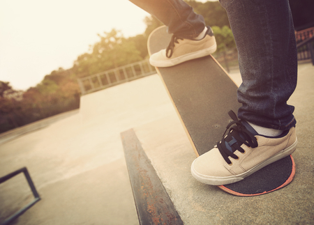 skateboarding legs at skateparkの写真素材