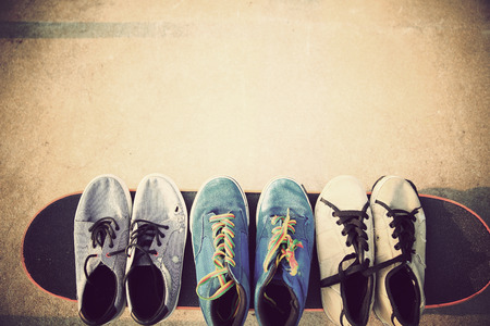 sneakers and skateboard at skateparkの写真素材