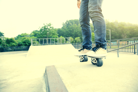 freeline skateboarder legs riding on freeline at skateparkの写真素材
