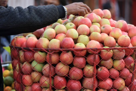 fresh indian apple selling at street in nepalの写真素材