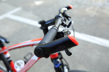 closeup of mountain bike at parking lotの写真素材